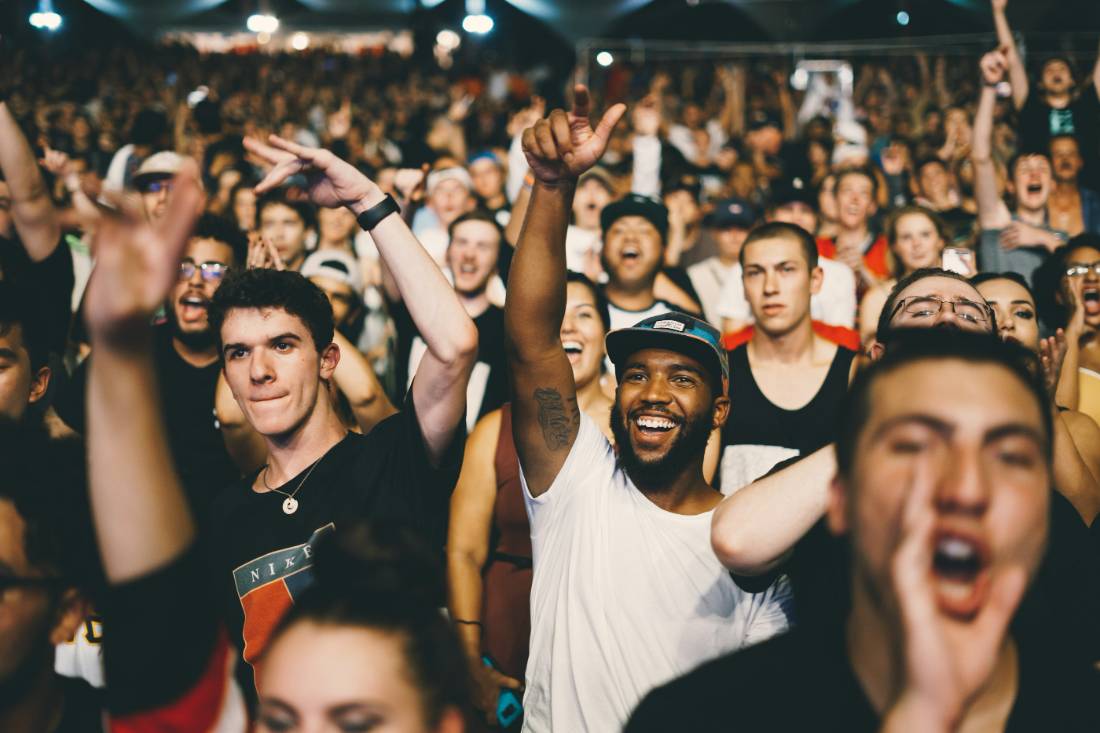 Fans packed into a stadium for a live sporting event